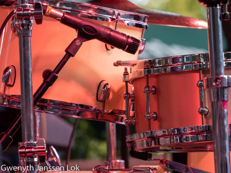 Close-up of a drum kit and microphones on stage at the Delft Jazz Festival